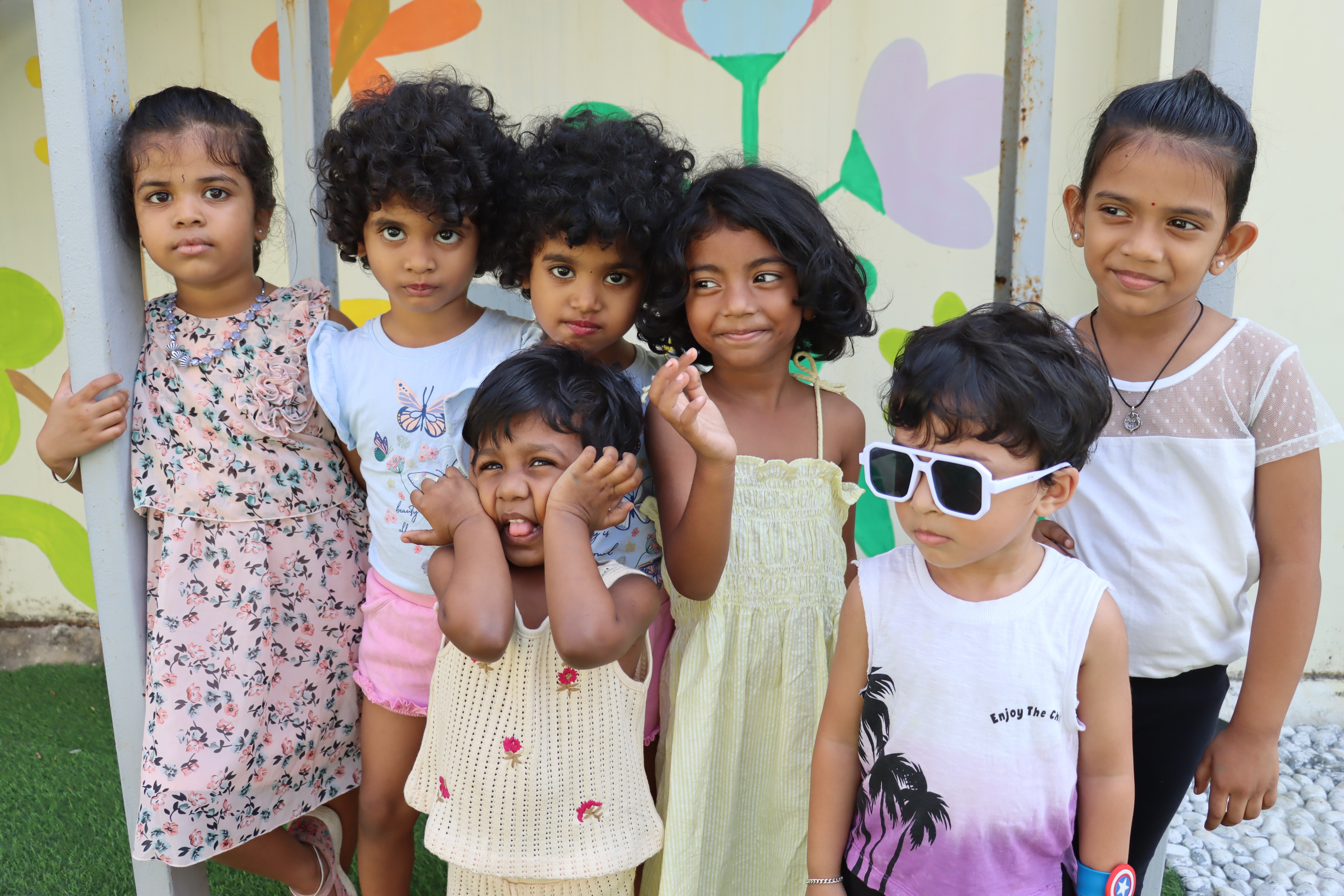 Group of AWS Early Years children with diverse expressions