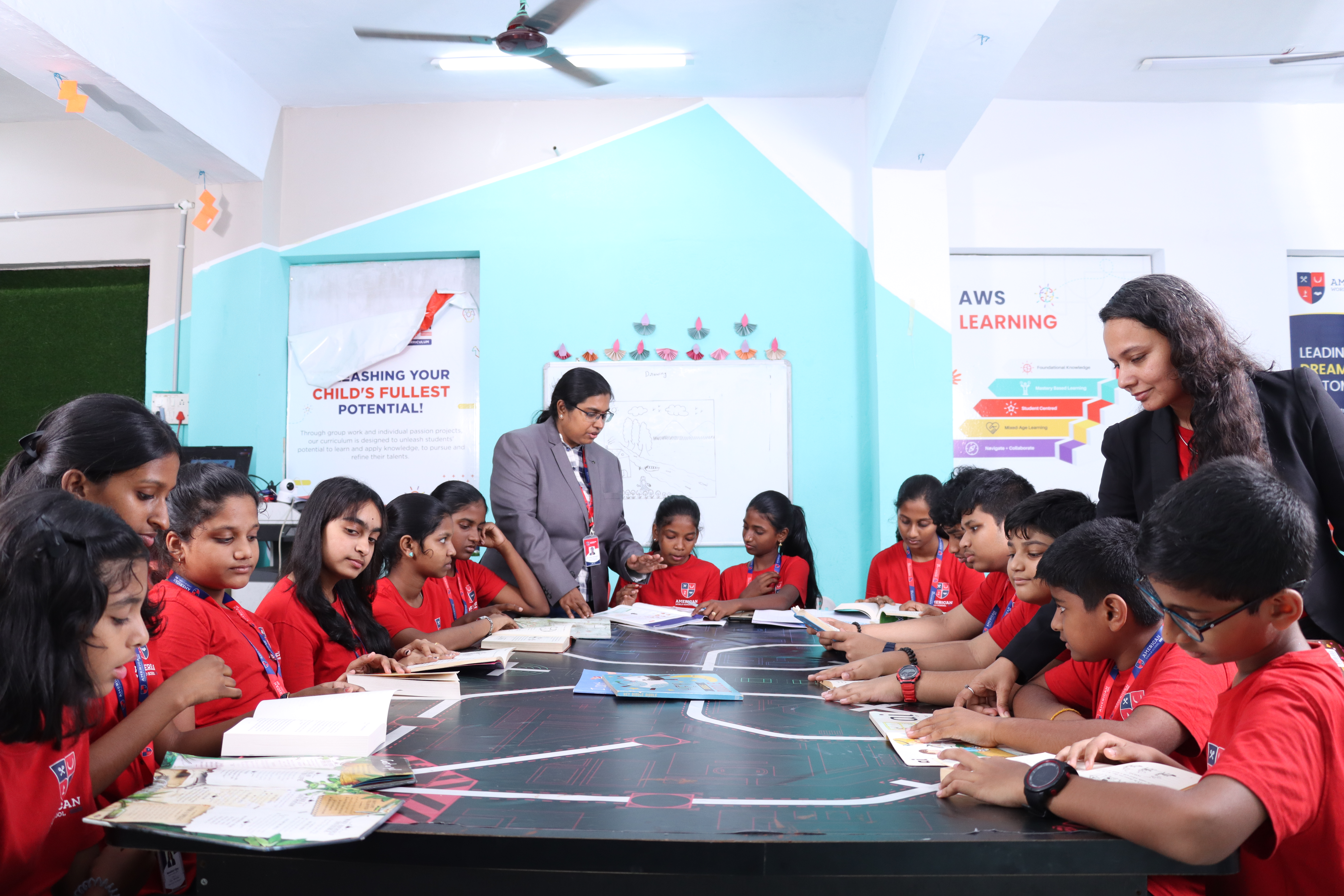 AWS middle school students in a Harkness-style roundtable discussion