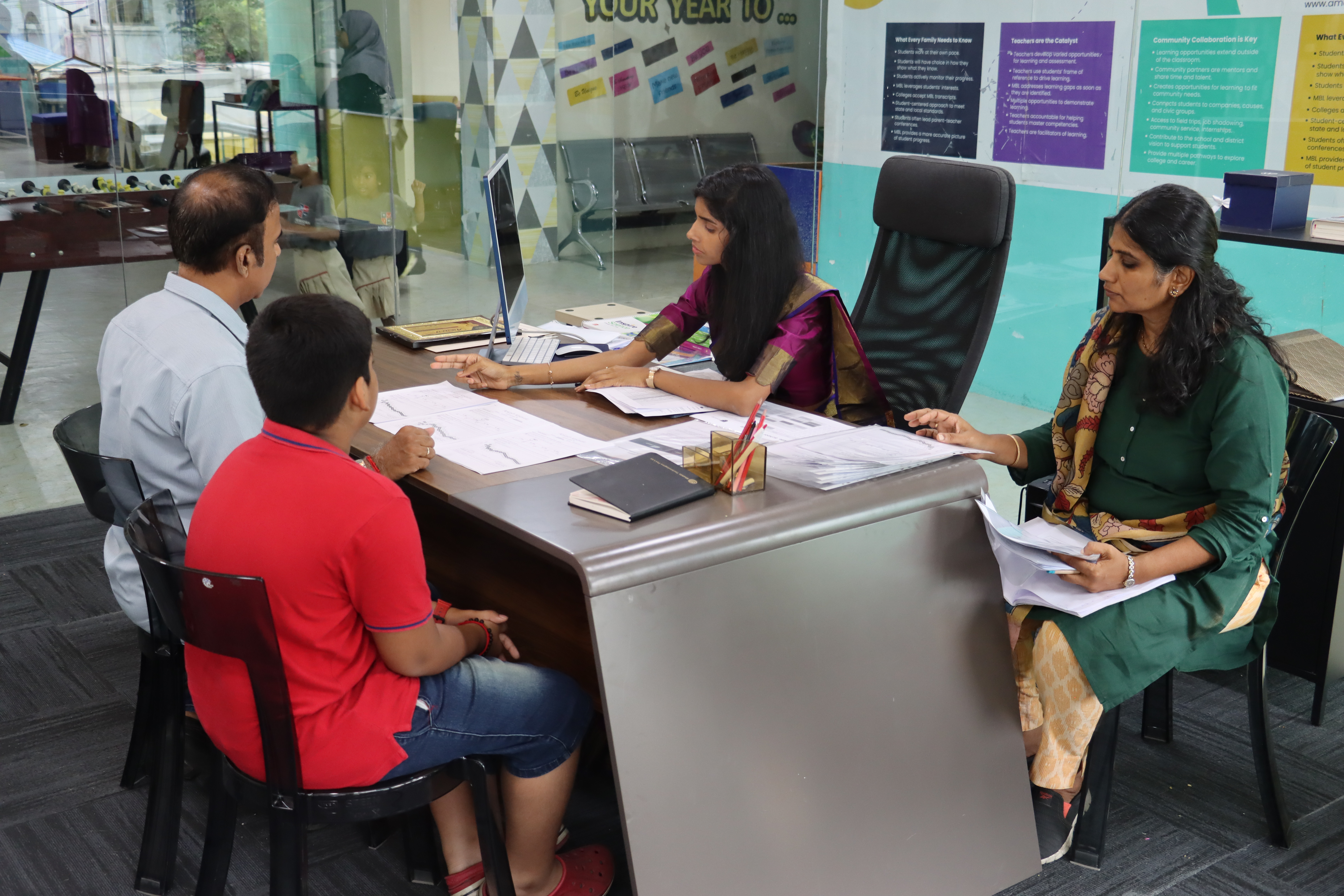 AWS counsellors meeting with a parent and child during admission