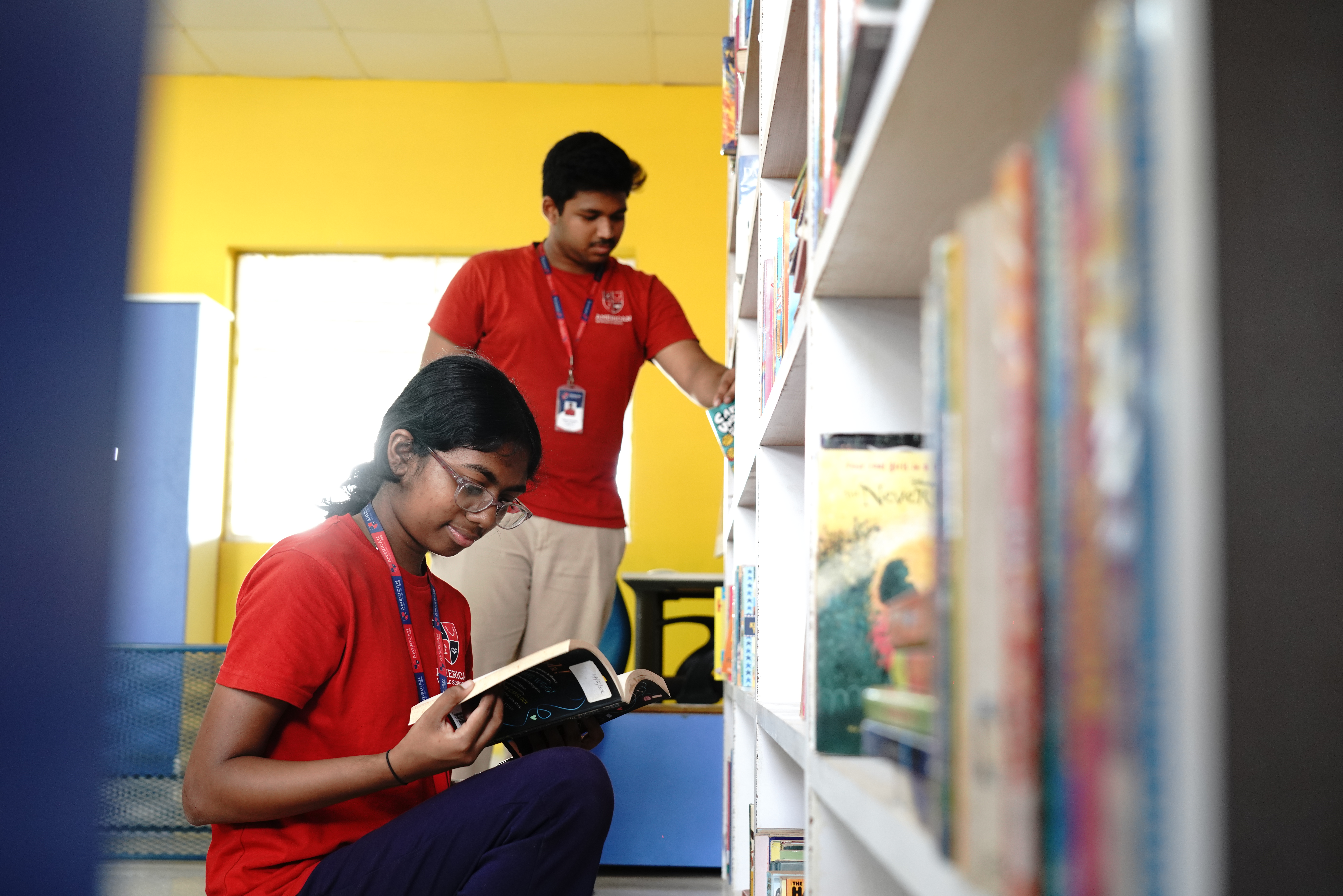 AWS students reading together in the library