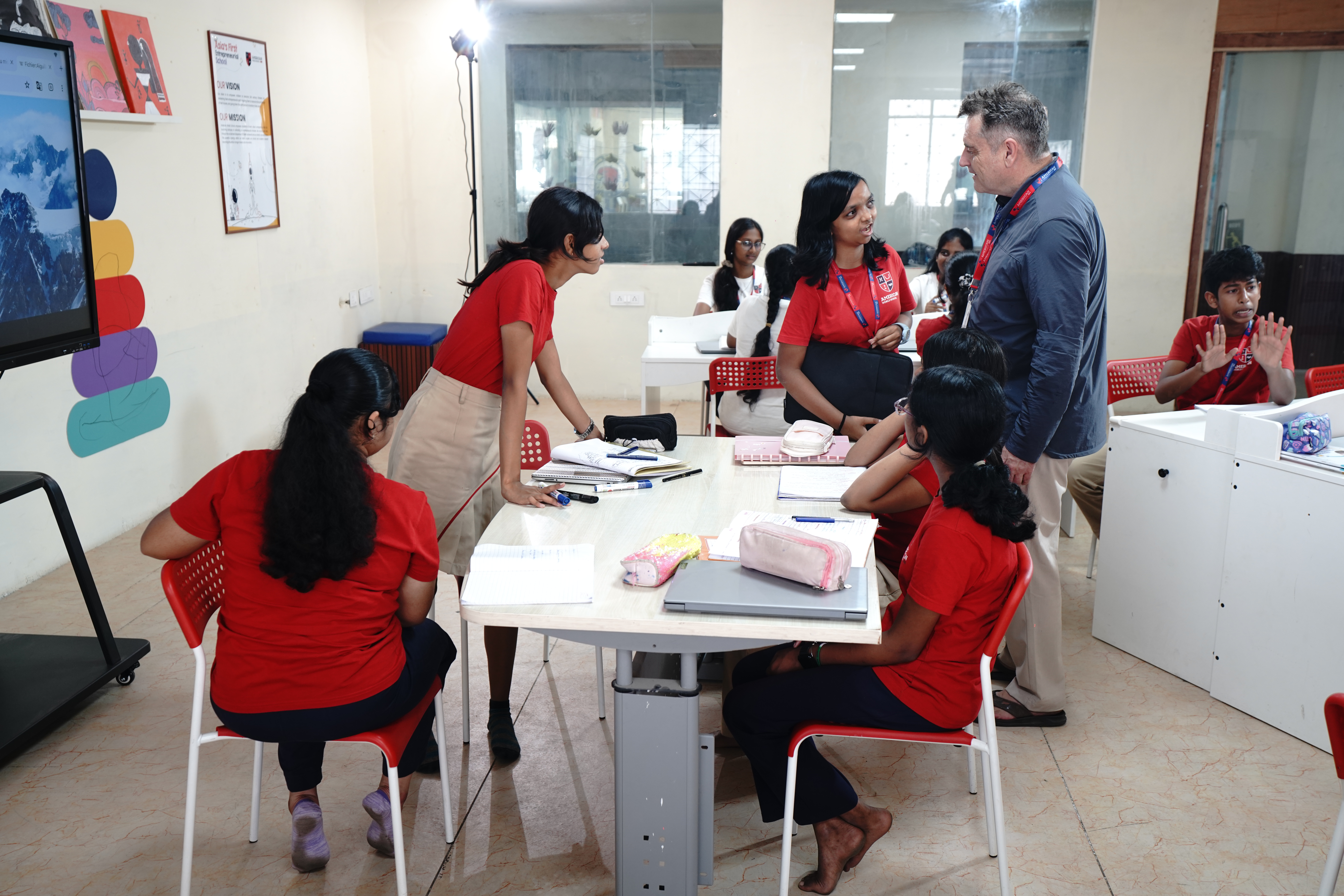 AWS teacher in a one-on-one conversation with a student